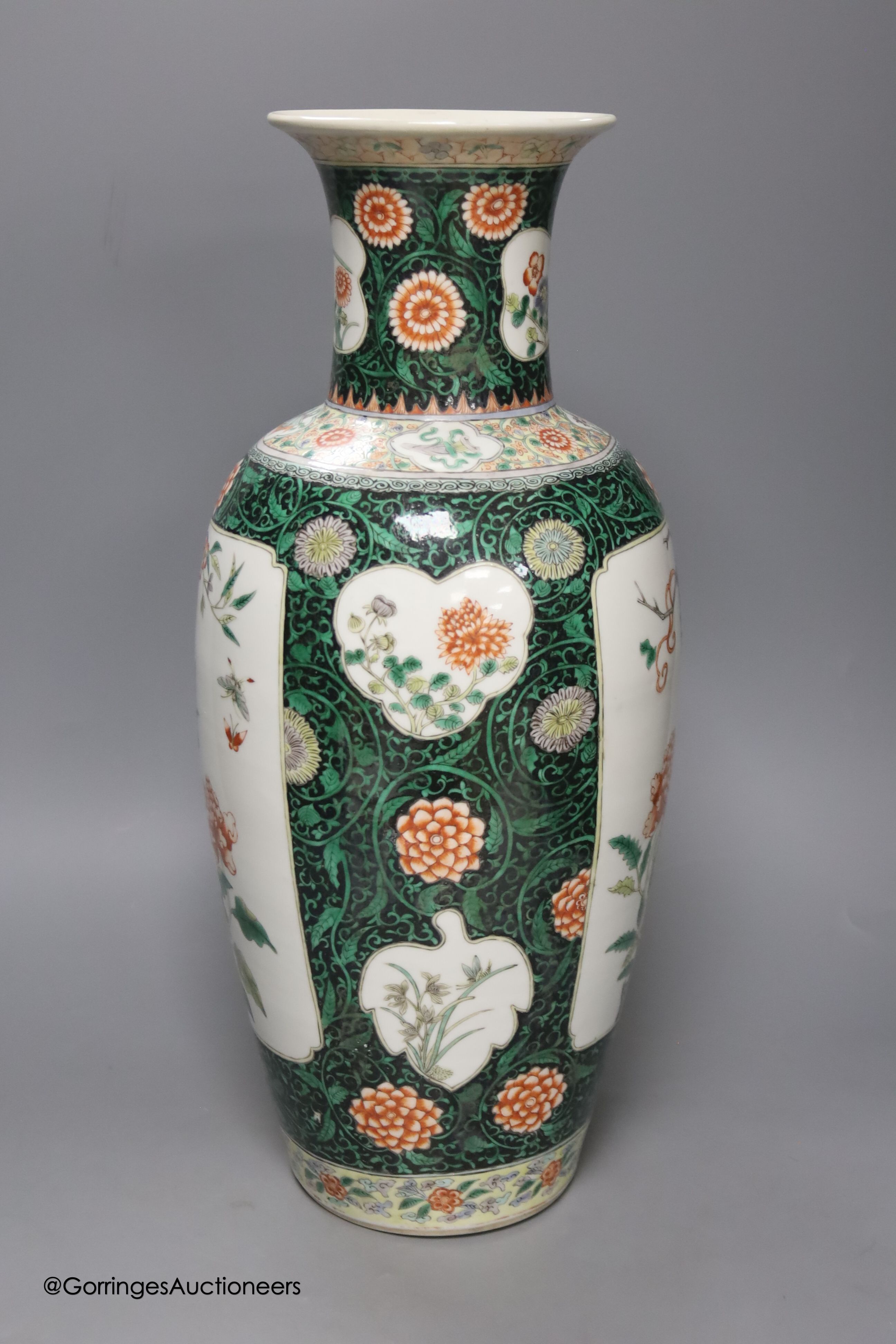 A large 19th century Chinese famille noire vase, height 46cm, restored neck